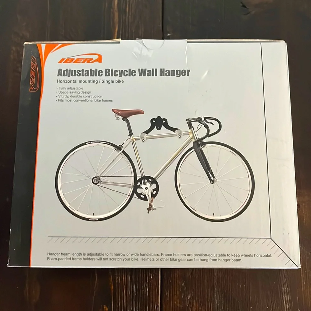 bicycle wall mount- Adjustable & new in box! Perfect to organize garage